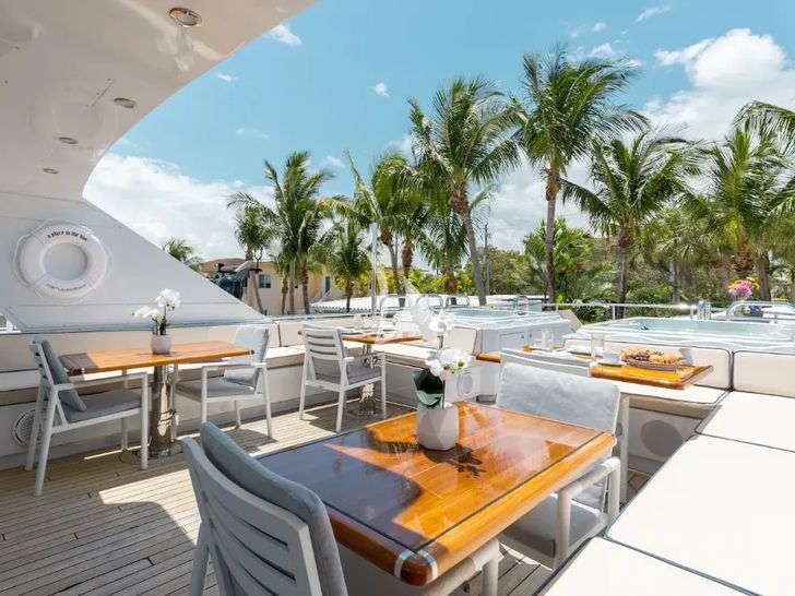 A PLACE IN THE SUN Broward 100 flybridge dining tables A PLACE IN THE SUN Broward 100 flybridge dining tables