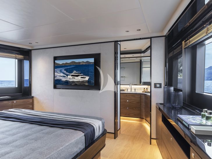 A4A Absolute Navetta 68 master cabin bed and TV A4A Absolute Navetta 68 master cabin bed and TV
