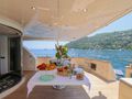 ACCAMA DELTA Azimut 30m - shaded aft deck with breakfast setup ACCAMA DELTA Azimut 30m - shaded aft deck with breakfast setup