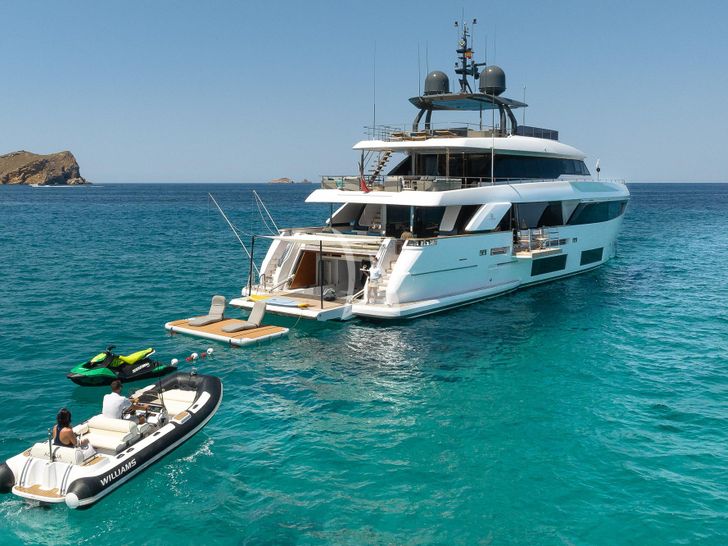 ACQUA Ferretti Custom Line Navetta 33 - anchored with water toys ACQUA Ferretti Custom Line Navetta 33 - anchored with water toys