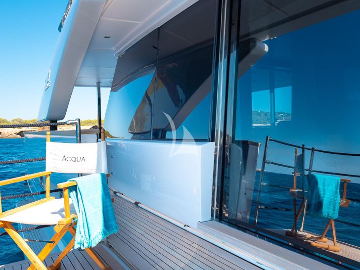 ACQUA Ferretti Custom Line Navetta 33 - foldable chair on the cabin balcony ACQUA Ferretti Custom Line Navetta 33 - foldable chair on the cabin balcony