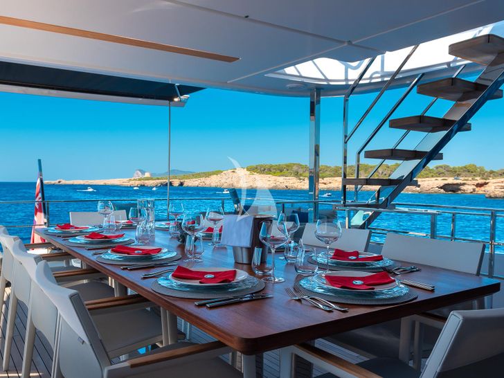 ACQUA Ferretti Custom Line Navetta 33 - alfresco dining area ACQUA Ferretti Custom Line Navetta 33 - alfresco dining area