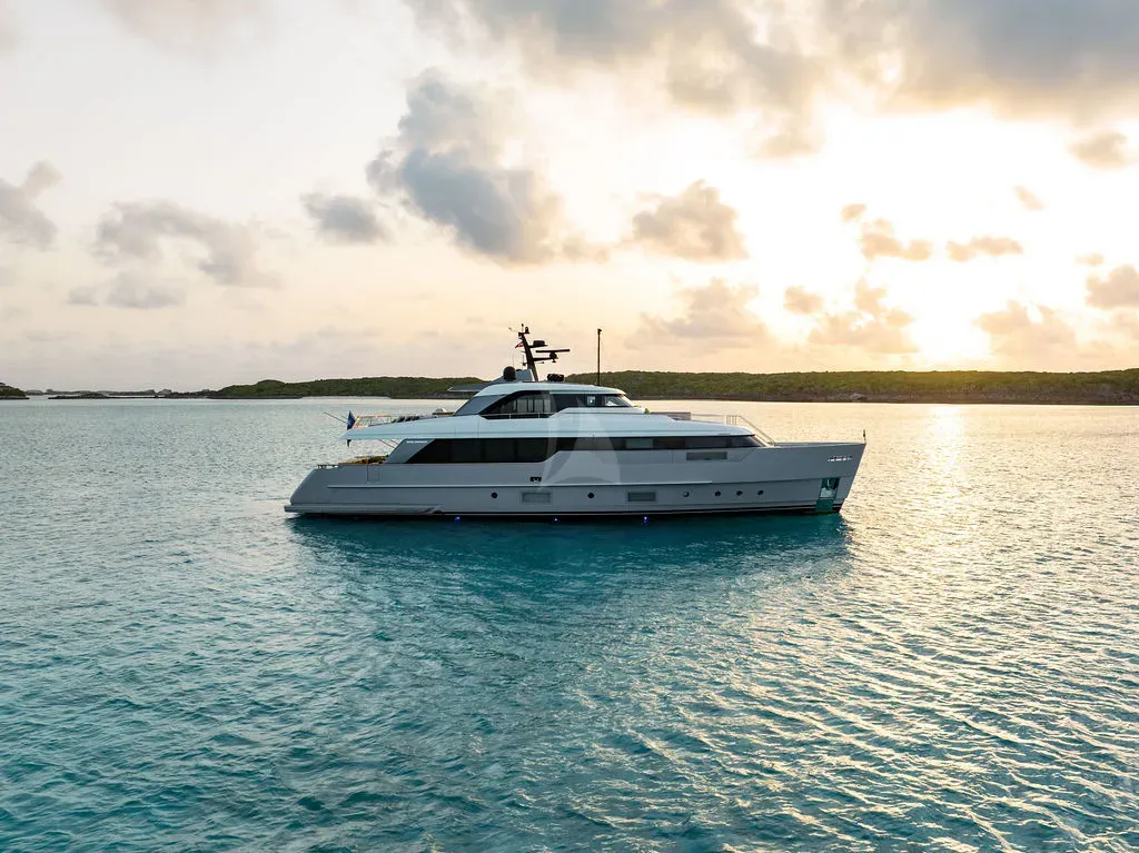 ADIOS Sanlorenzo SD96 - anchored under the sunset