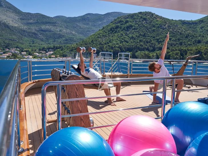 AETERNA Radez Custom Yacht 53m - guests working out AETERNA Radez Custom Yacht 53m - guests working out