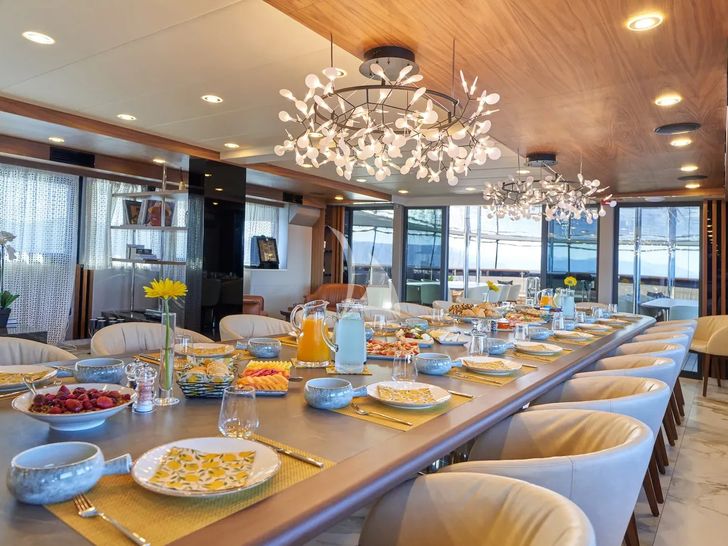 AETERNA Radez Custom Yacht 53m - indoor dining set up AETERNA Radez Custom Yacht 53m - indoor dining set up