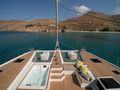 AETHER Fountaine Pajot Alegria 67 - foredeck lounge,trampolines,and jacuzzi