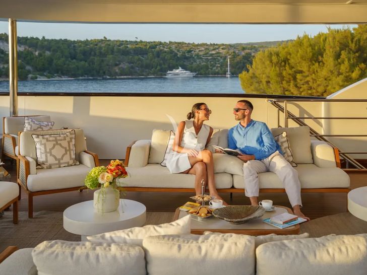 AGAPE ROSE Custom Yacht 48m - guests in the sun deck lounge AGAPE ROSE Custom Yacht 48m - guests in the sun deck lounge