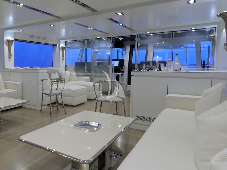 ALEXANDRA Wally Ace 27m saloon seating and minibar ALEXANDRA Wally Ace 27m saloon seating and minibar