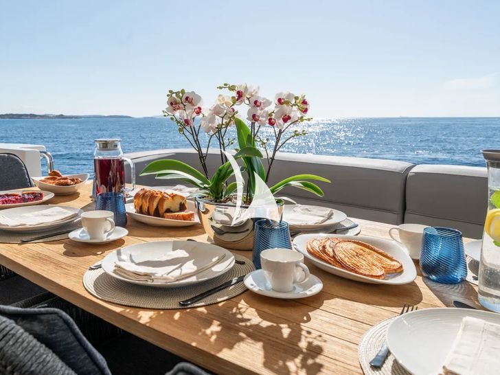 ALFA Posillipo Technema 80 aft deck breakfast set up ALFA Posillipo Technema 80 aft deck breakfast set up