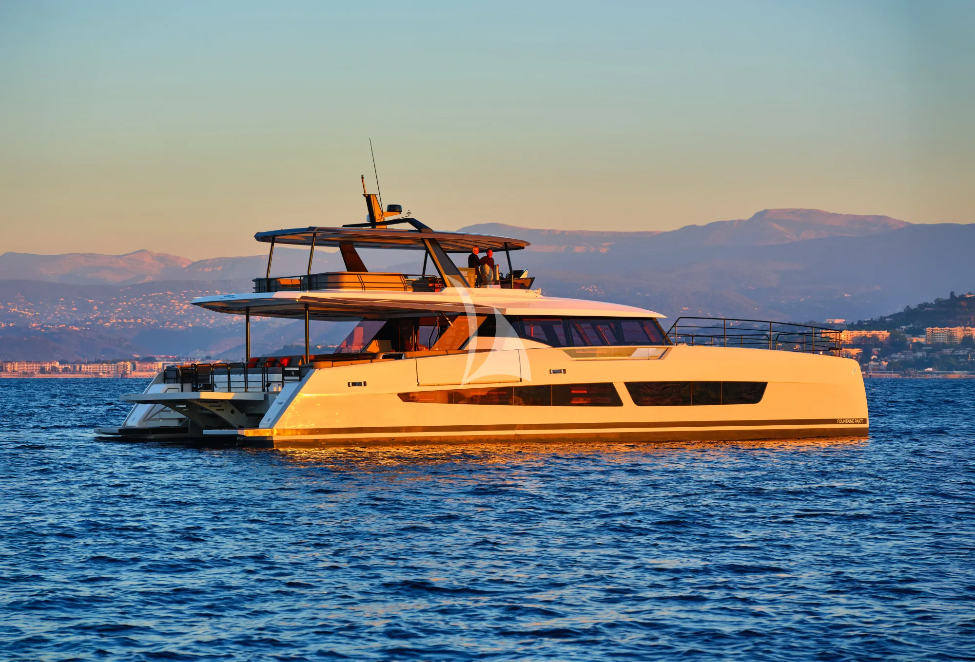 ALINA Fountaine Pajot Power 80 - anchored under the sunset