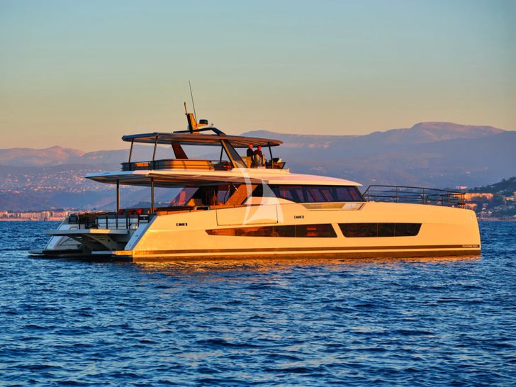 ALINA Fountaine Pajot Power 80 - anchored under the sunset ALINA Fountaine Pajot Power 80 - anchored under the sunset