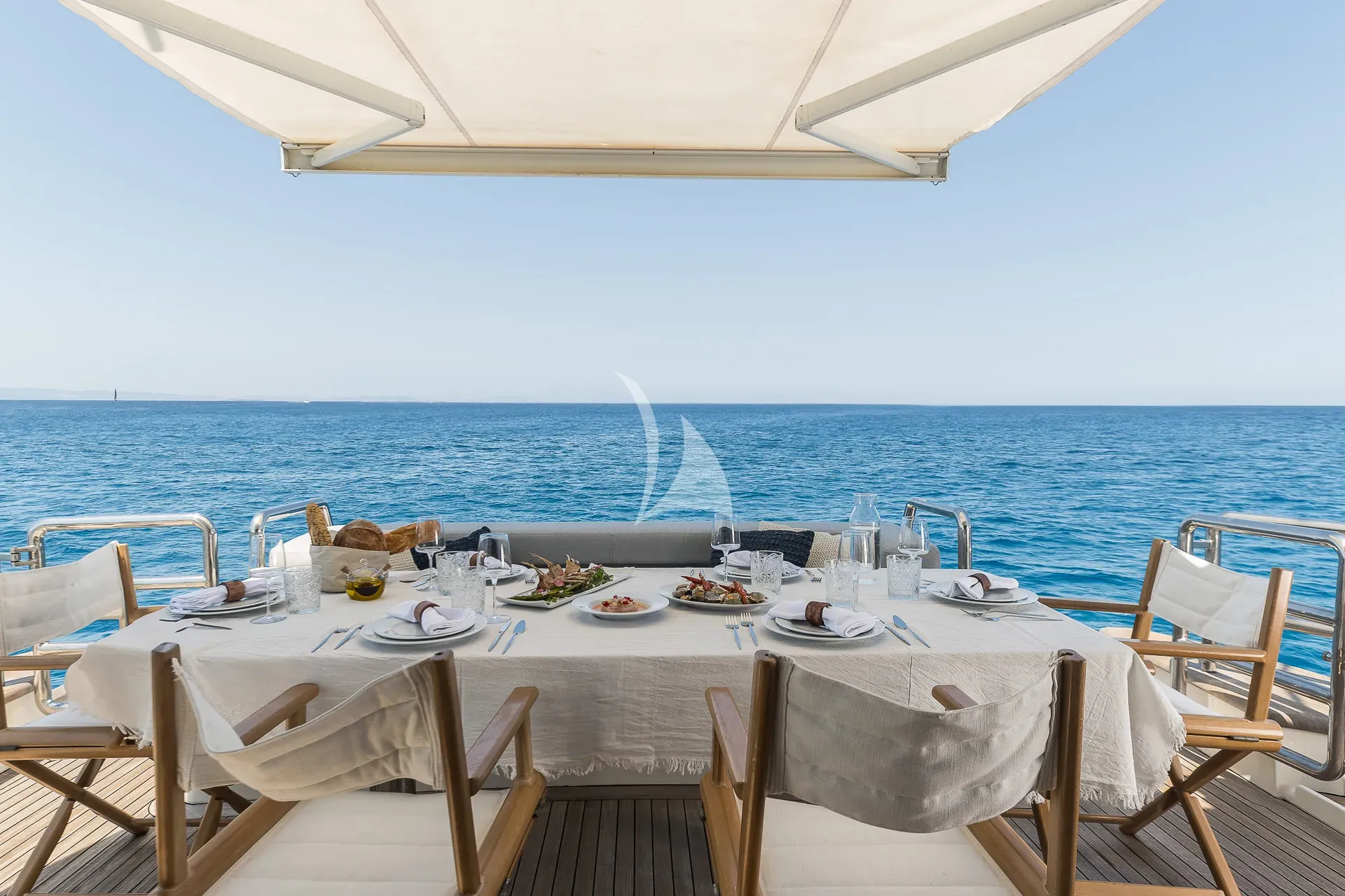 ALMAR II Azimut Magellano 76 - aft deck alfresco dining set up