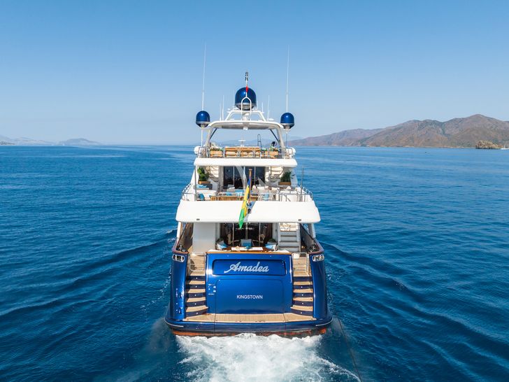 AMADEA Benetti Classic 115 cruising stern view AMADEA Benetti Classic 115 cruising stern view