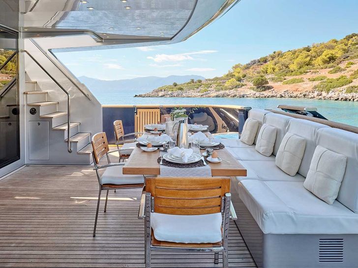 AMICI PER SEMPRE Baglietto 34m - aft deck alfresco dining set up AMICI PER SEMPRE Baglietto 34m - aft deck alfresco dining set up