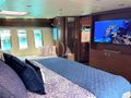 AMMONITE Nordhavn Custom 23m master cabin bed and TV
