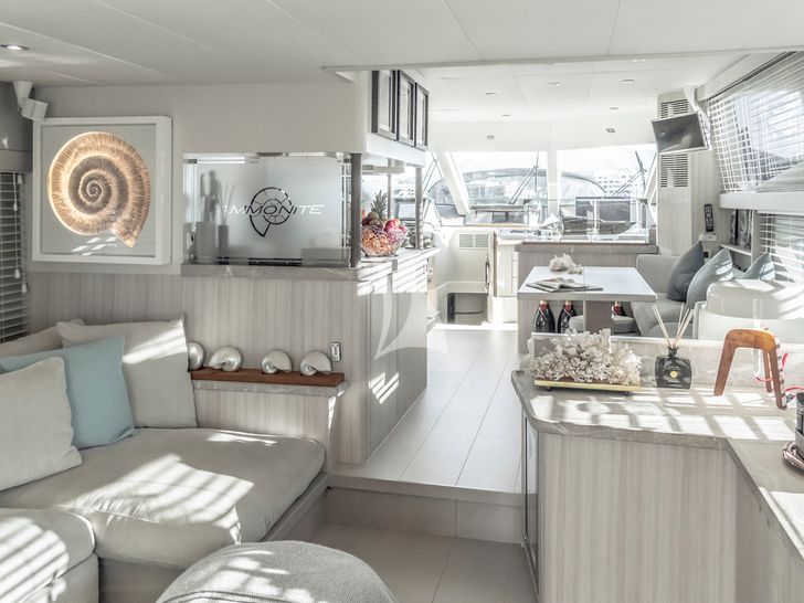 AMMONITE Numarine 78 saloon and indoor dining area AMMONITE Numarine 78 saloon and indoor dining area