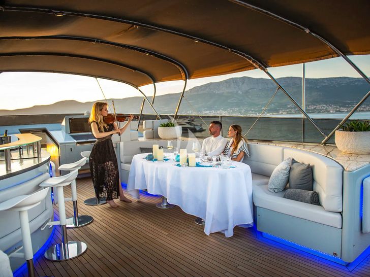 ANAVI Admiral 35 - sun deck dinner date with a violinist ANAVI Admiral 35 - sun deck dinner date with a violinist