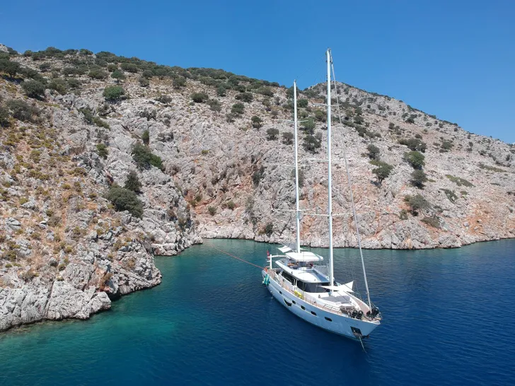 ANGELO III Custom Gulet 35m - anchored near an island ANGELO III Custom Gulet 35m - anchored near an island