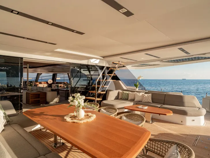 ANIMA Fountaine Pajot Power 80 - aft deck alfresco dining area ANIMA Fountaine Pajot Power 80 - aft deck alfresco dining area