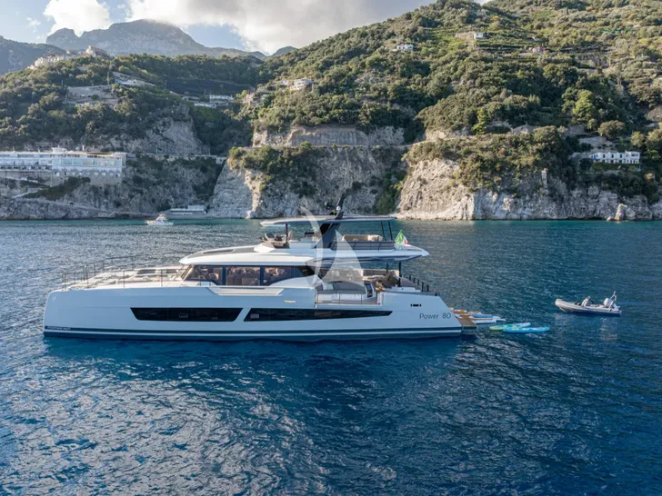 ANIMA Fountaine Pajot Power 80 - anchored with the water toys ANIMA Fountaine Pajot Power 80 - anchored with the water toys