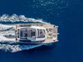 ANIMA Fountaine Pajot Power 80 - cruising top aerial shot ANIMA Fountaine Pajot Power 80 - cruising top aerial shot