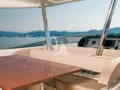 ANYTHING GOES IV Riva Duchessa 92 - flybridge dining lounge and helm ANYTHING GOES IV Riva Duchessa 92 - flybridge dining lounge and helm