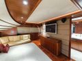 ANNE MARIE Ferretti Custom Line 97 - master cabin seating and TV ANNE MARIE Ferretti Custom Line 97 - master cabin seating and TV