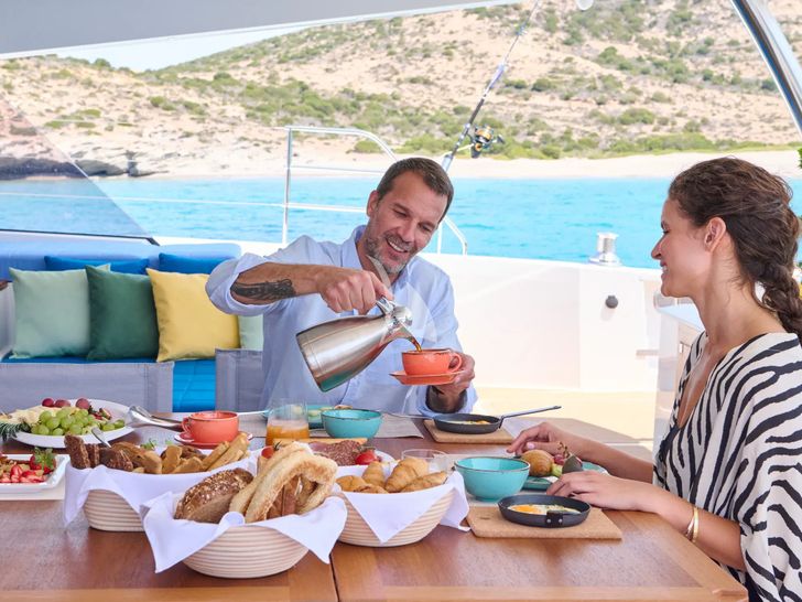 APHAEA Fountaine Pajot Alegria 67 - guests having breakfast APHAEA Fountaine Pajot Alegria 67 - guests having breakfast