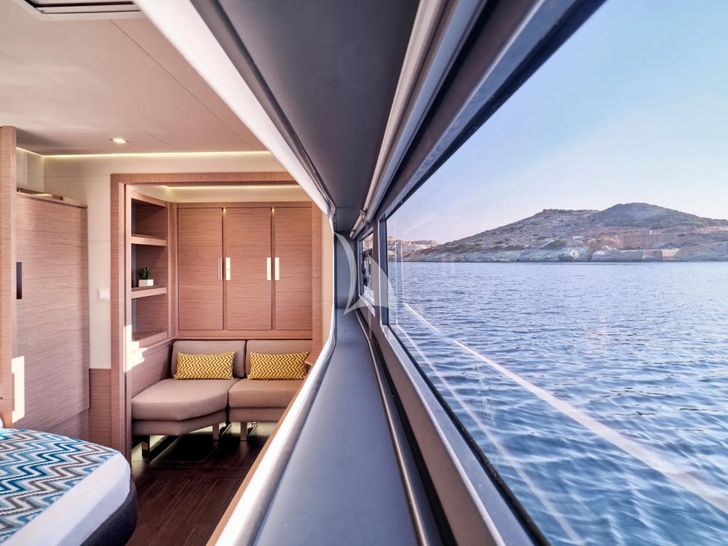APHAEA Fountaine Pajot Alegria 67 - master cabin seating and window APHAEA Fountaine Pajot Alegria 67 - master cabin seating and window