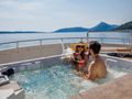 APNA Saba Yacht Custom 34m - guests in the jacuzzi APNA Saba Yacht Custom 34m - guests in the jacuzzi