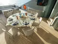 AQUANOVA Palmer Johnson 150 - main aft deck alfresco dining area AQUANOVA Palmer Johnson 150 - main aft deck alfresco dining area