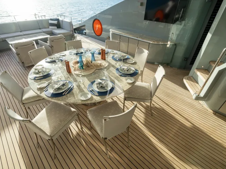 AQUANOVA Palmer Johnson 150 - main aft deck alfresco dining area AQUANOVA Palmer Johnson 150 - main aft deck alfresco dining area