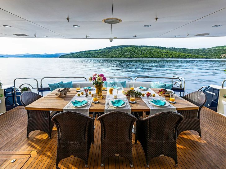 ARAGO Sunseeker 34m - main aft deck alfresco dining area ARAGO Sunseeker 34m - main aft deck alfresco dining area