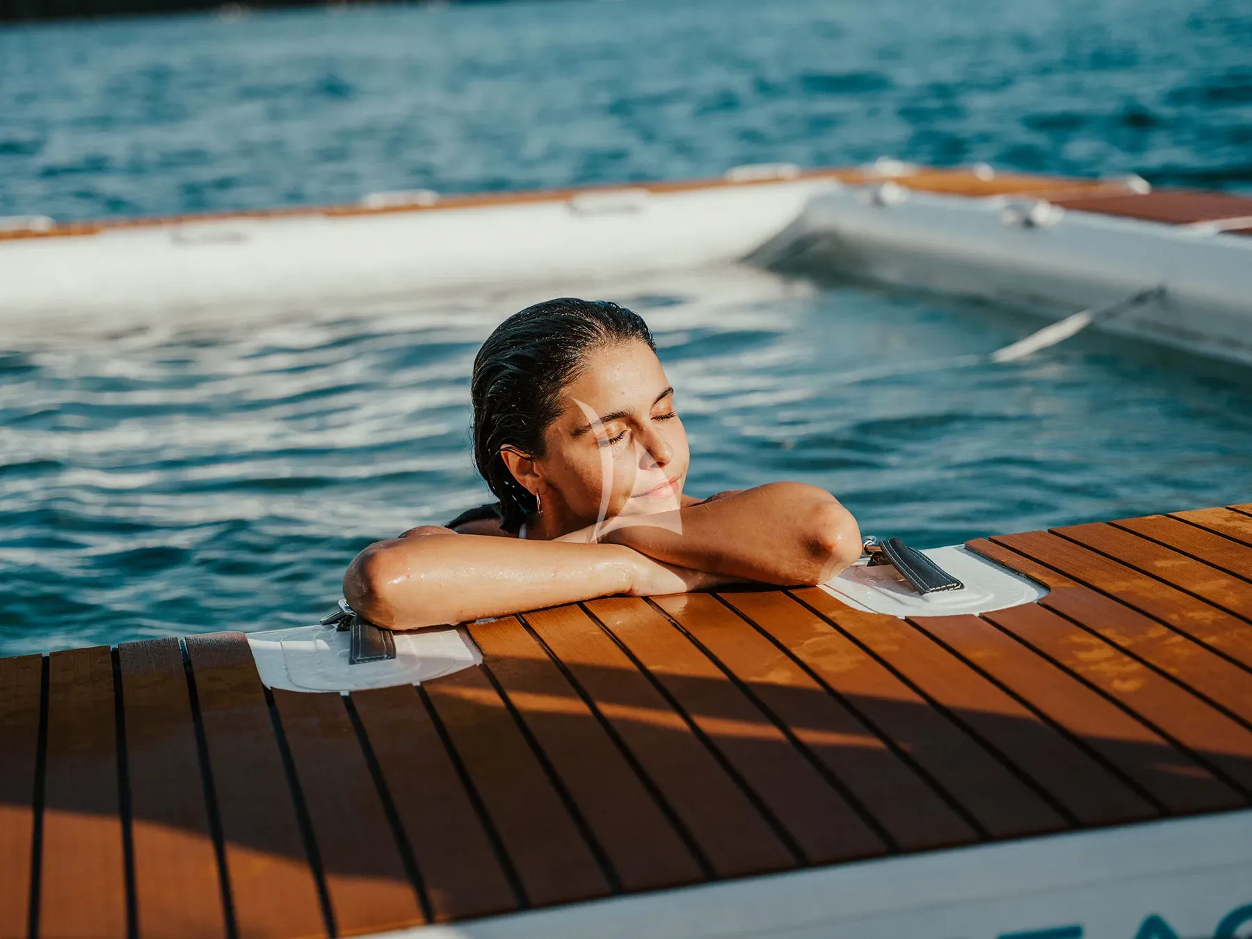 ARESYA Sanlorenzo SL120A - guests relaxing in the water