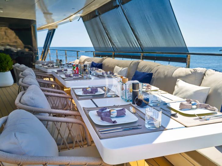 ARGO Custom 55m - upper deck dining set up ARGO Custom 55m - upper deck dining set up