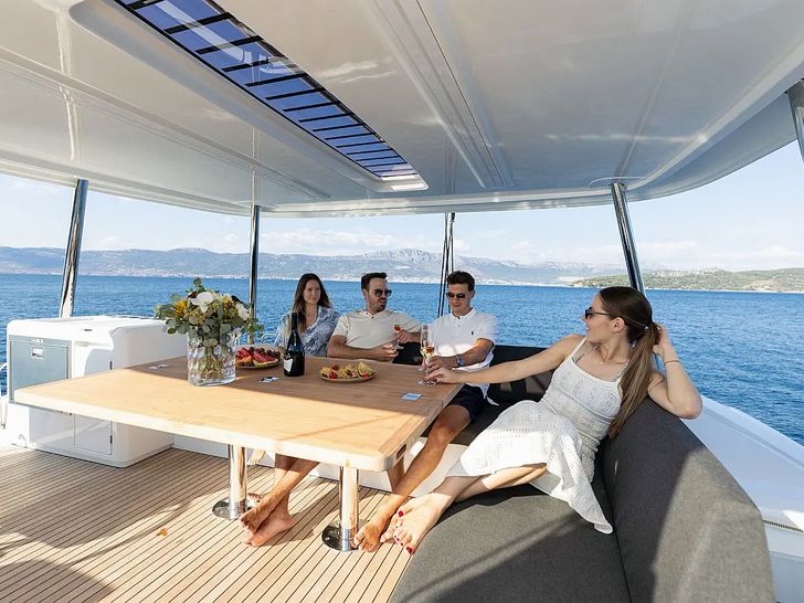 ARTISAN Lagoon 55 - guests on the flybridge ARTISAN Lagoon 55 - guests on the flybridge