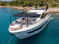 ASCEND Sunseeker 23m - anchored bow view near an island ASCEND Sunseeker 23m - anchored bow view near an island