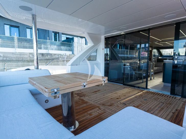 ASCEND Sunseeker 23m - main aft deck lounge and dining area ASCEND Sunseeker 23m - main aft deck lounge and dining area