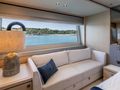 ASCEND Sunseeker 23m - master cabin couch by the glass window ASCEND Sunseeker 23m - master cabin couch by the glass window