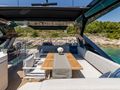 ASCEND Sunseeker 23m - sundeck dining area shaded ASCEND Sunseeker 23m - sundeck dining area shaded