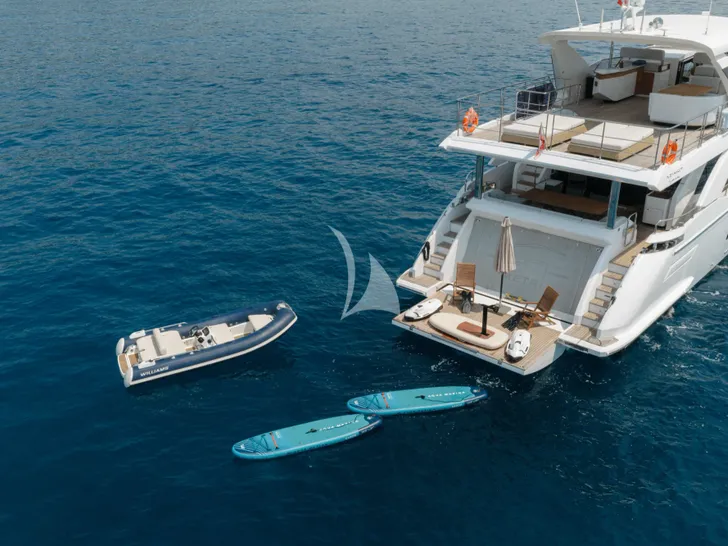 AURA Azimut Grande 27m - aft shot with the water toys AURA Azimut Grande 27m - aft shot with the water toys