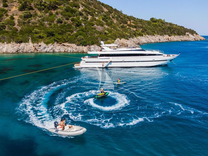 AXELLA Eurocraft 110 anchored with guests using the water toys
