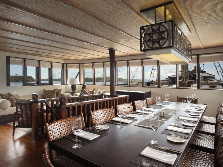 ALILA PURNAMA Phinisi Sailing Yacht 46m - indoor dining area ALILA PURNAMA Phinisi Sailing Yacht 46m - indoor dining area