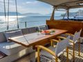 BARACUDA VALETTA Perini Navi Sailing Yacht 50m - flybridge dining area BARACUDA VALETTA Perini Navi Sailing Yacht 50m - flybridge dining area