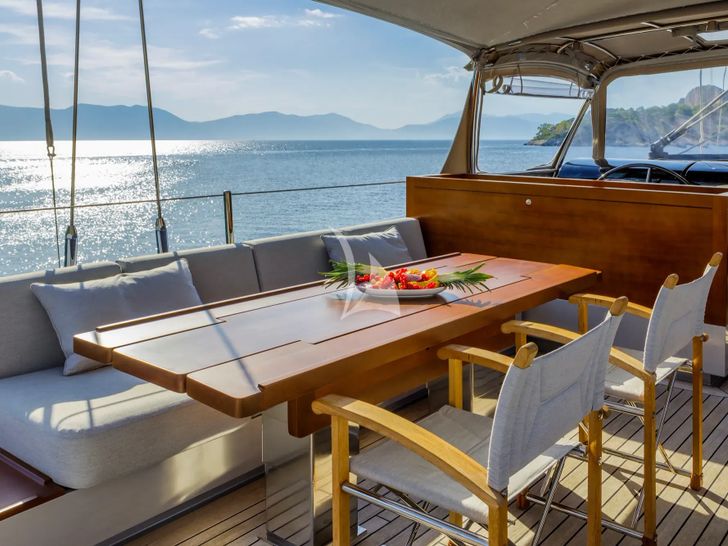 BARACUDA VALETTA Perini Navi Sailing Yacht 50m - flybridge dining area BARACUDA VALETTA Perini Navi Sailing Yacht 50m - flybridge dining area