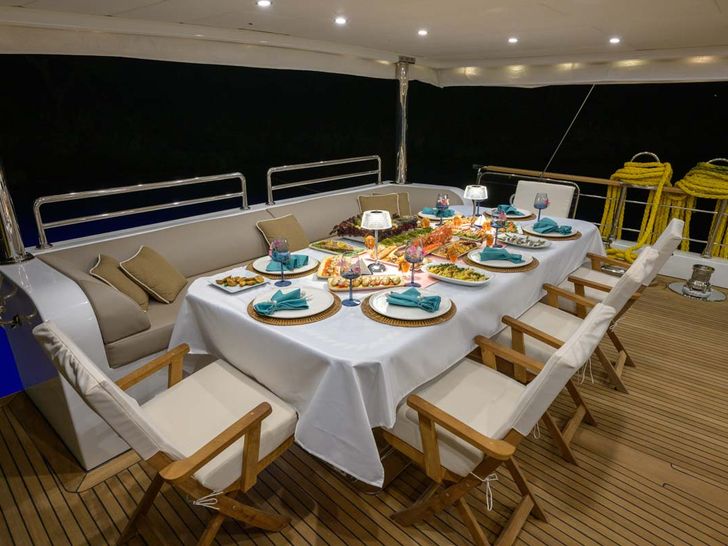 BELGIN SULTAN Custom Sailing Yacht 35m - alfresco dining set up BELGIN SULTAN Custom Sailing Yacht 35m - alfresco dining set up