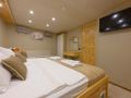 BELGIN SULTAN Custom Sailing Yacht 35m - master cabin bed and TV BELGIN SULTAN Custom Sailing Yacht 35m - master cabin bed and TV