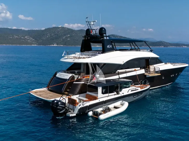 BELLA LUNA Monte Carlo 26m - anchored with the chase boat and dinghy BELLA LUNA Monte Carlo 26m - anchored with the chase boat and dinghy