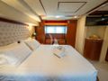 BELLAS BOY Ferretti 80 - master cabin bed with TV BELLAS BOY Ferretti 80 - master cabin bed with TV
