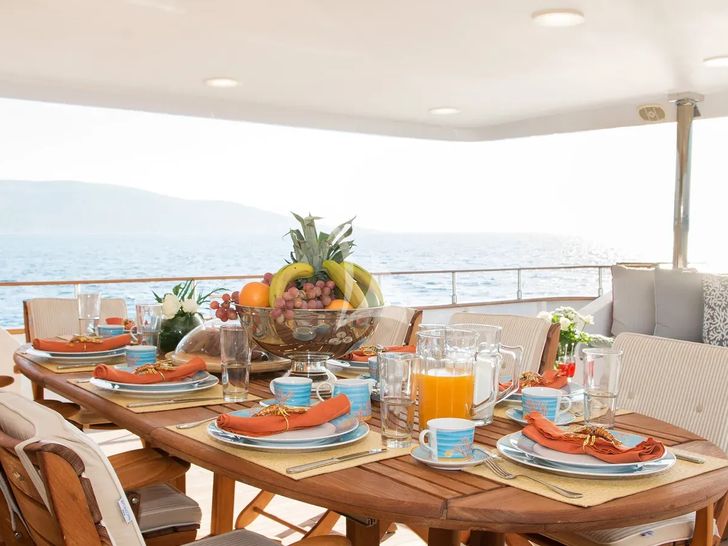 BELLA STELLA CRN Ancona 45m - main aft deck alfresco dining set up BELLA STELLA CRN Ancona 45m - main aft deck alfresco dining set up